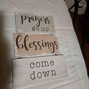 Prayers go up hanging sign